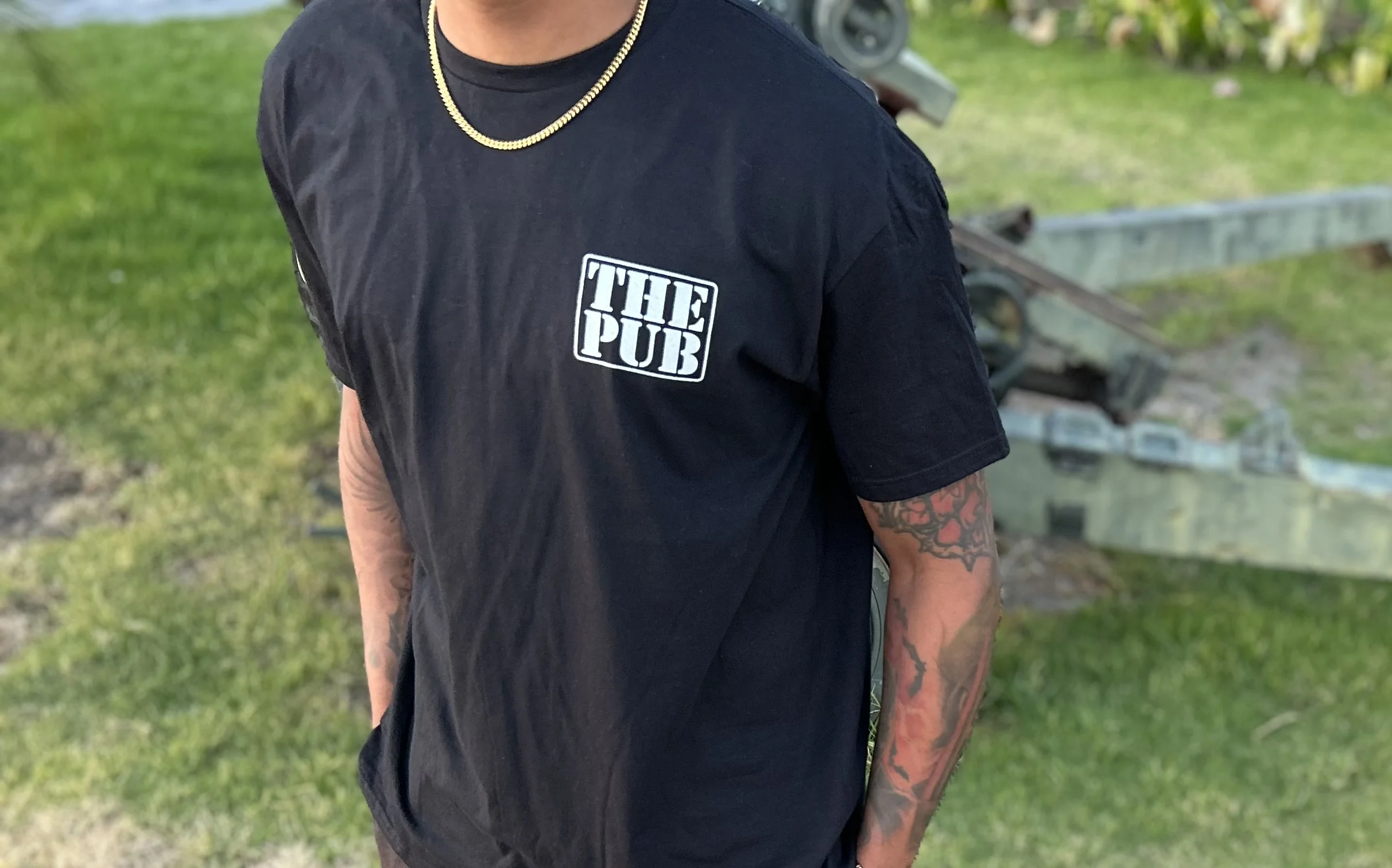 Black Pub at Fiddlers Green T-shirt with a white chest logo