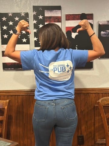 Back of a light blue Pub at Fiddlers Green T-shirt